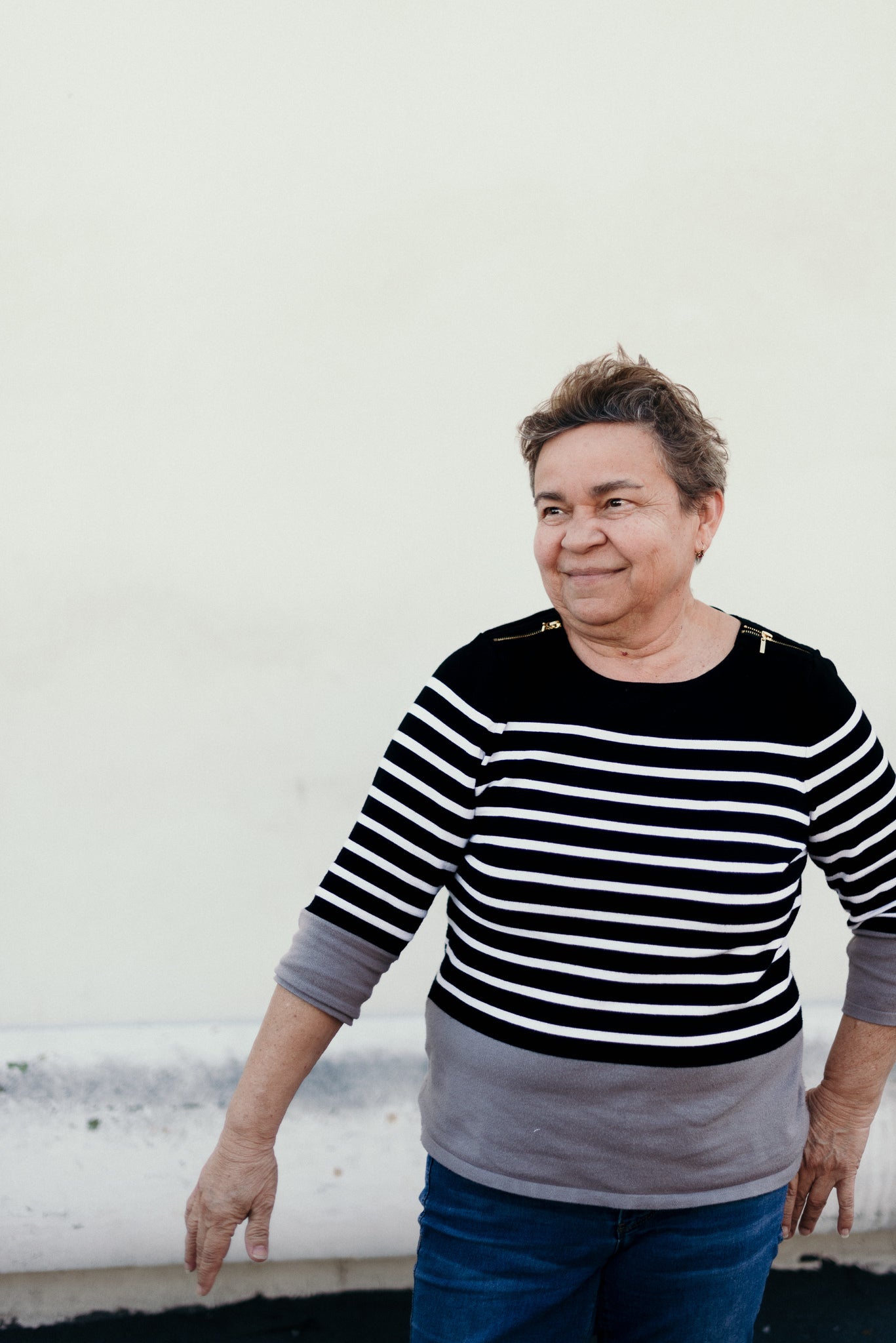 files/a-mature-woman-in-a-sweater-smiling.jpg